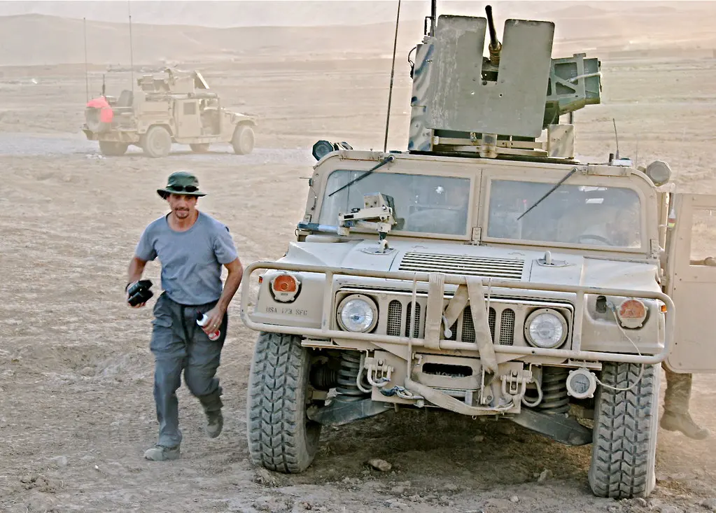 Running alongside a Humvee in Afghanistan