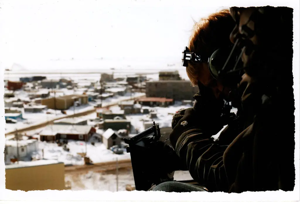 Filming from a helicopter over an Arctic town