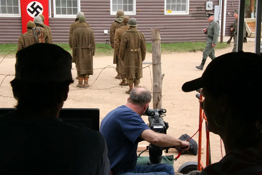 Filming a WWII reenactment through the barbed wire