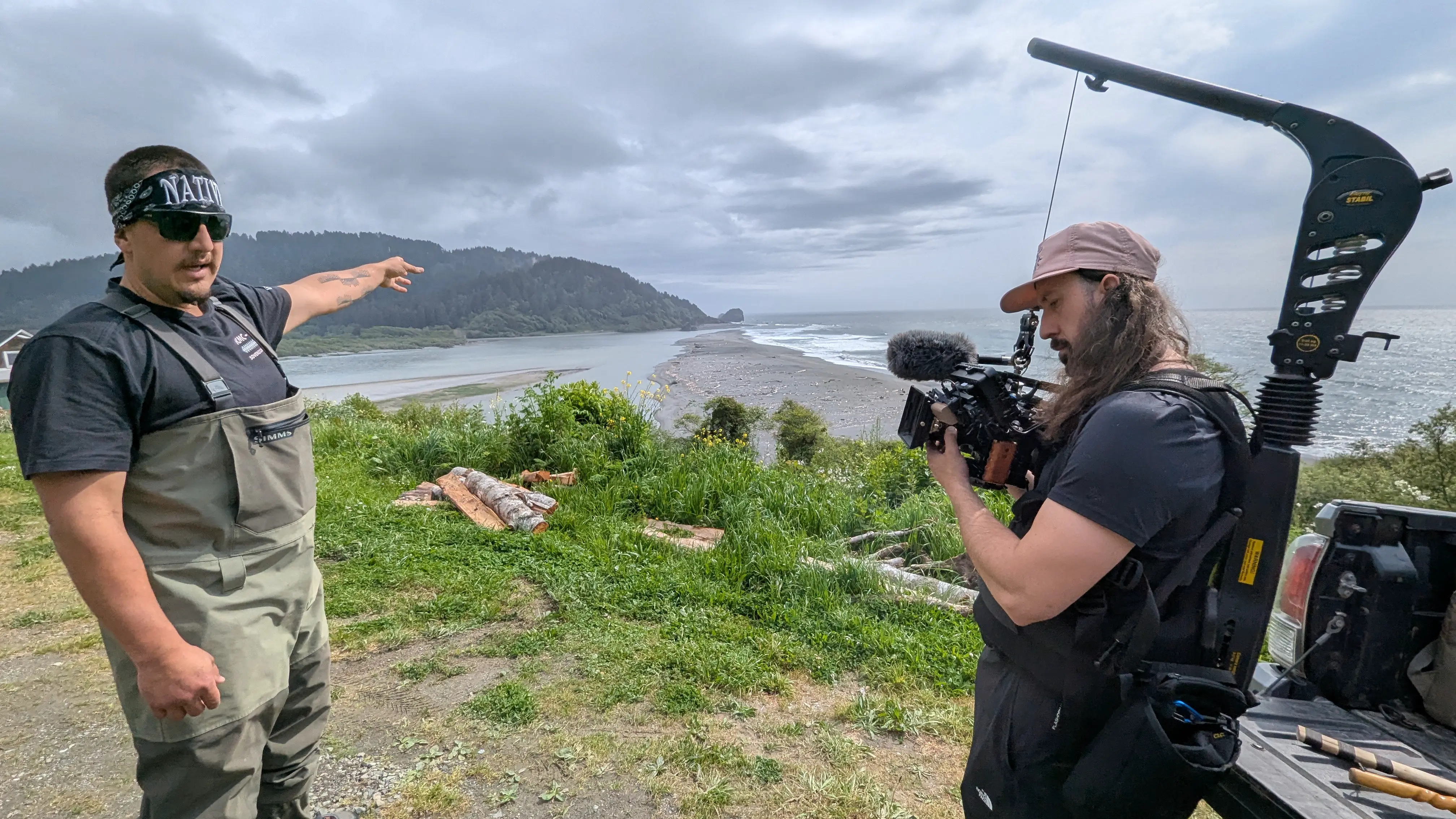 Filming on location at a coastal overlook