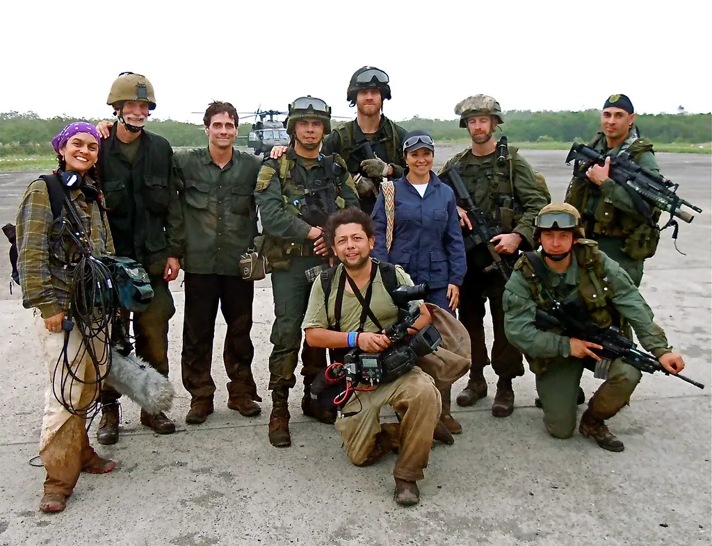 Crew with Colombian soldiers on an airstrip