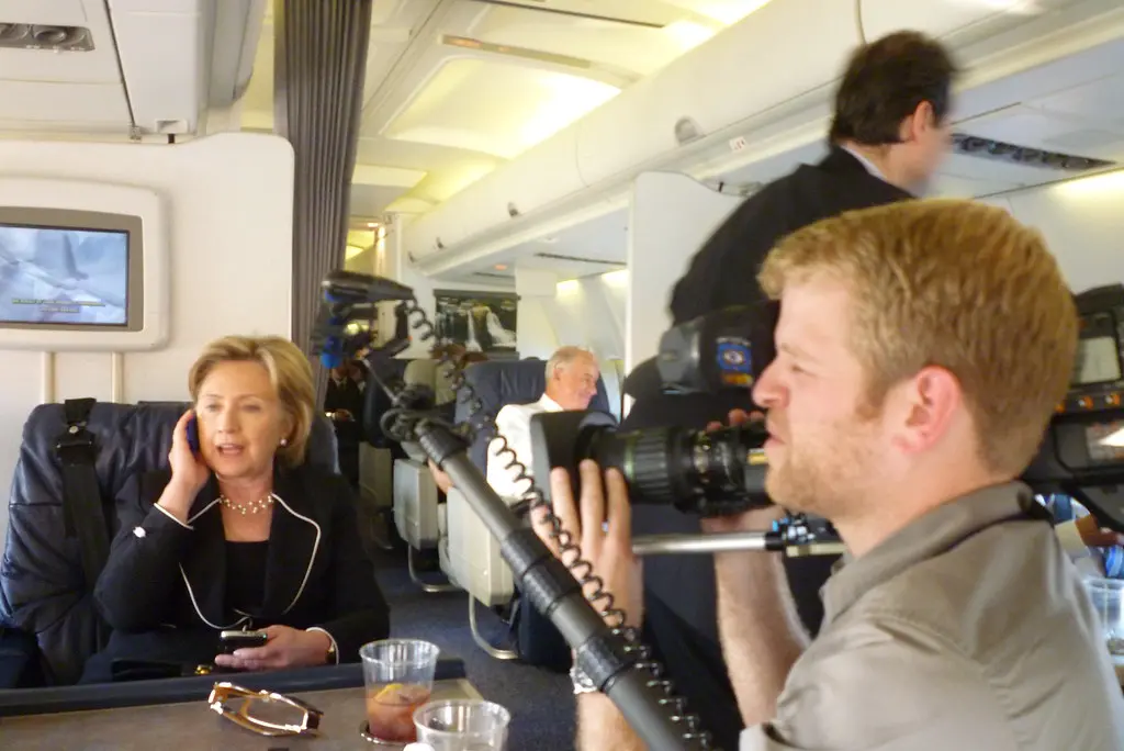 Filming an interview on a government plane